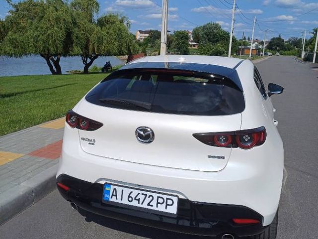 Mazda 3 - фото 4