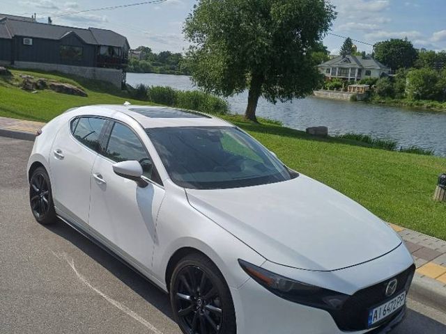 Mazda 3 - фото 2