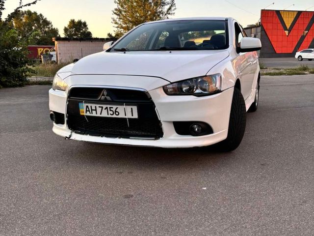 Mitsubishi Lancer - фото 1