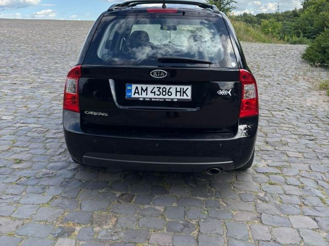 Kia Carens - фото 3