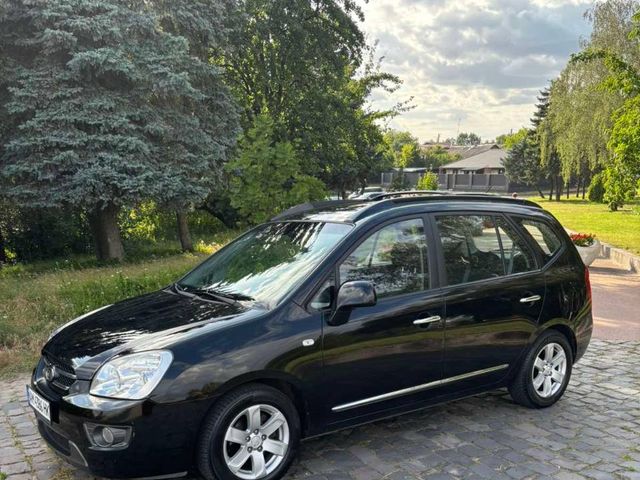 Kia Carens - фото 4