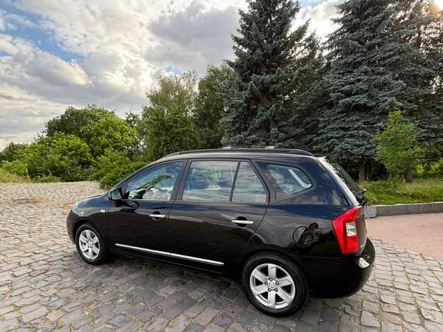 Kia Carens - фото 5