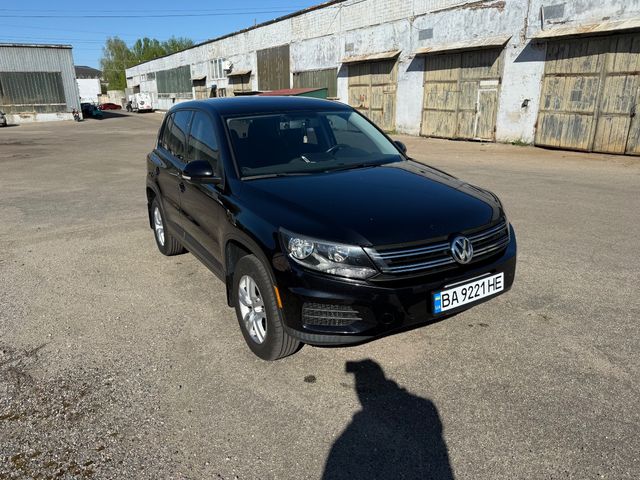 Volkswagen Tiguan - фото 1