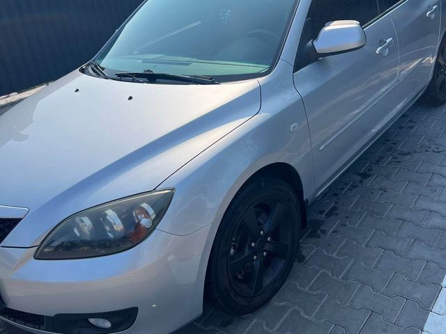 Mazda 3 - фото 4