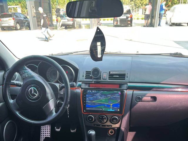 Mazda 3 - фото 5
