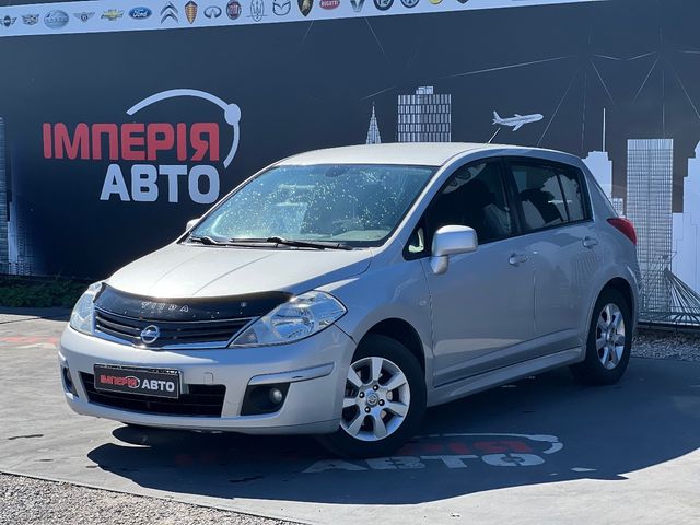 Nissan Tiida - фото 2