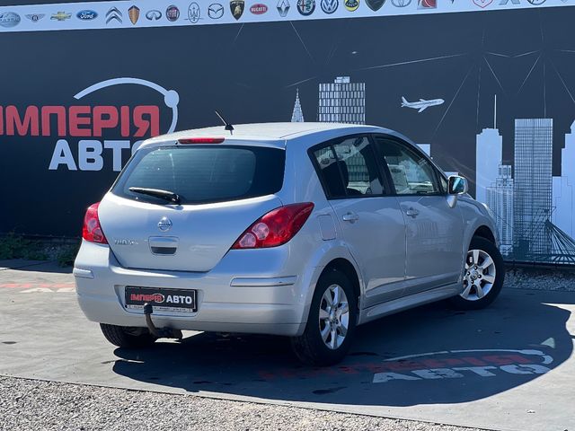 Nissan Tiida - фото 5