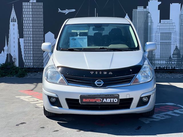 Nissan Tiida - фото 3