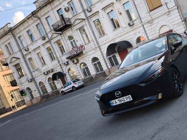 Mazda 3 - фото 4