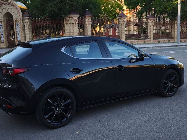 Mazda 3 - фото 2