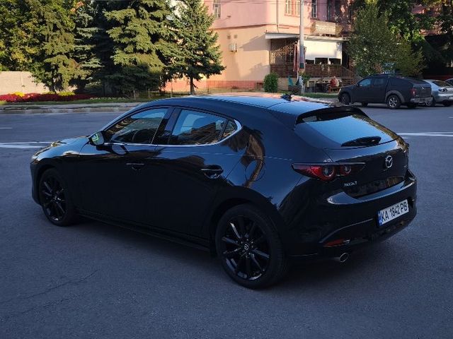 Mazda 3 - фото 3