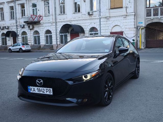 Mazda 3 - фото 1