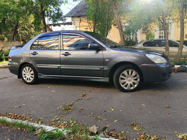 Mitsubishi Lancer - фото 5