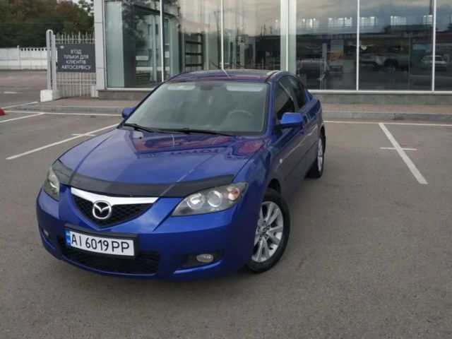 Mazda 3 - фото 1
