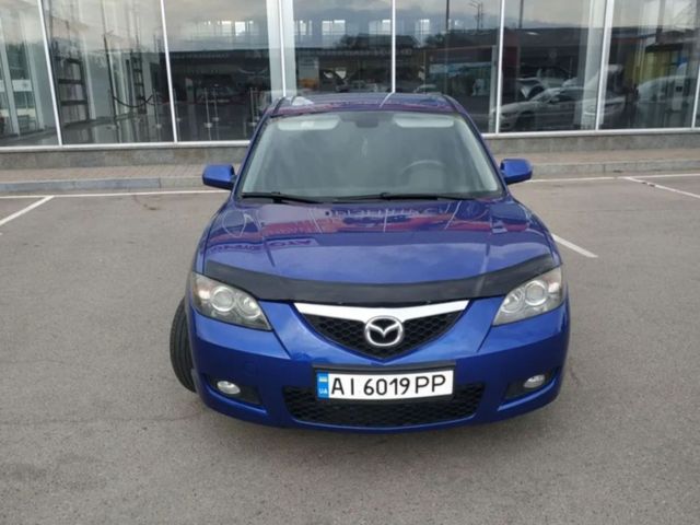 Mazda 3 - фото 2
