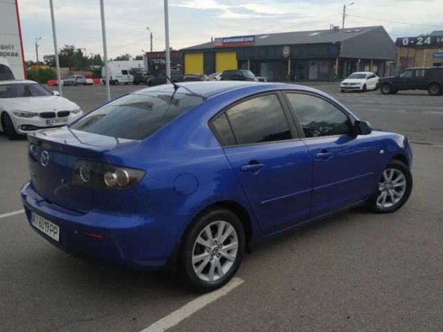 Mazda 3 - фото 4
