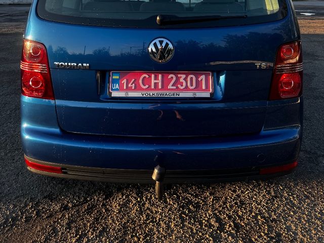 Volkswagen Touran - фото 4