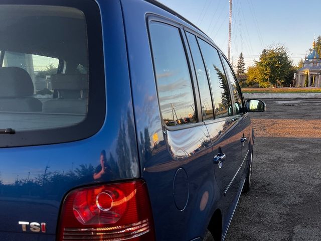 Volkswagen Touran - фото 5
