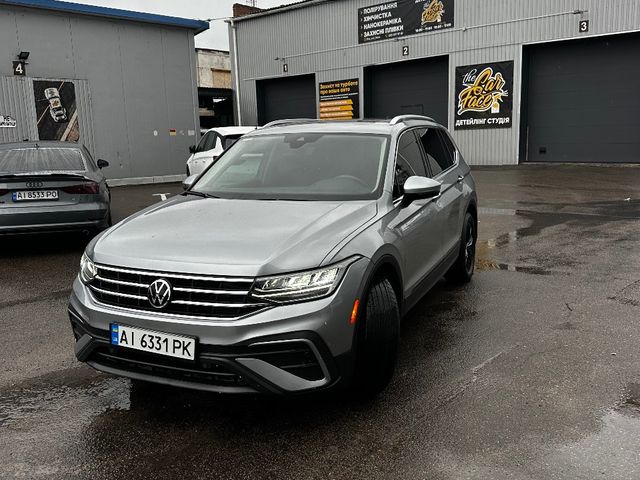 Volkswagen Tiguan - фото 1