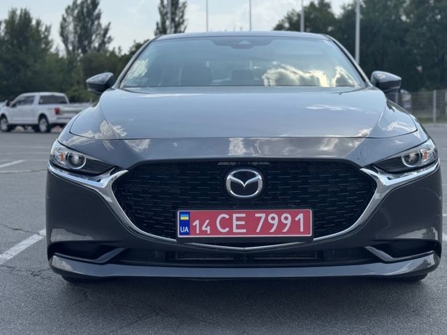 Mazda 3 - фото 2