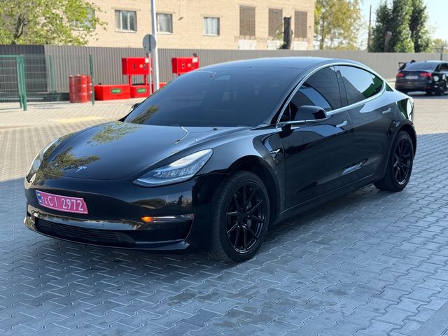 Tesla Model 3 - фото 1