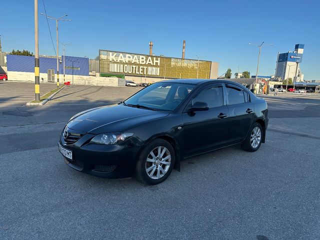 Mazda 3 - фото 3
