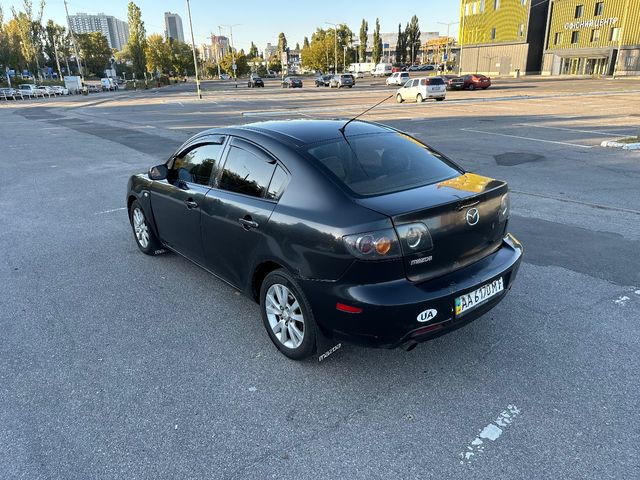 Mazda 3 - фото 5