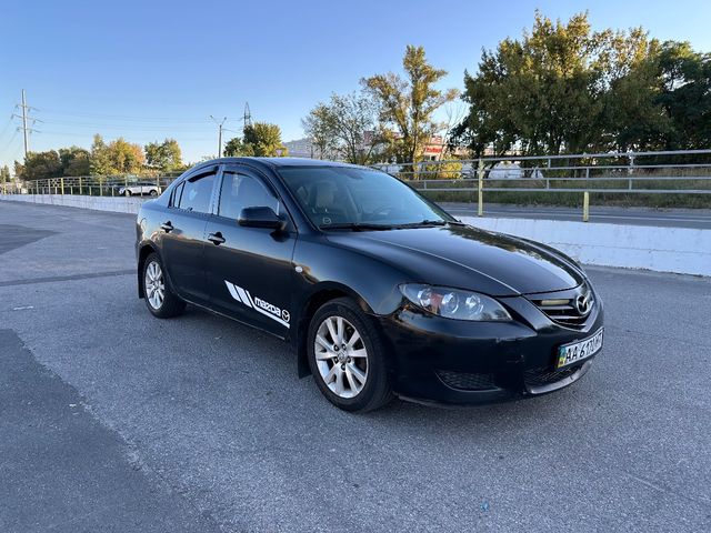 Mazda 3 - фото 1
