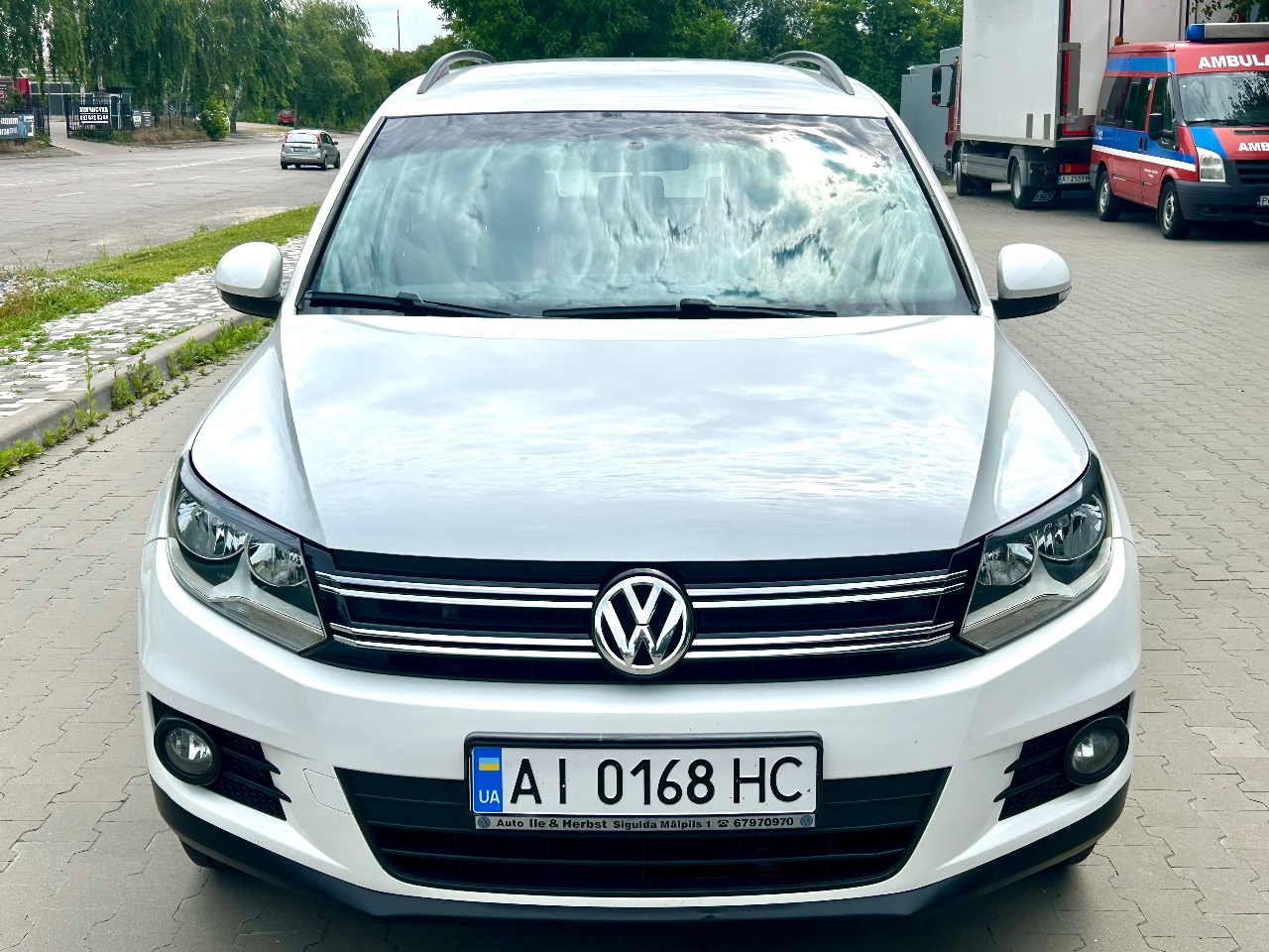 Volkswagen Tiguan - фото 1