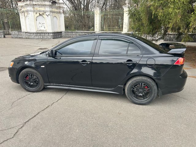Mitsubishi Lancer - фото 4