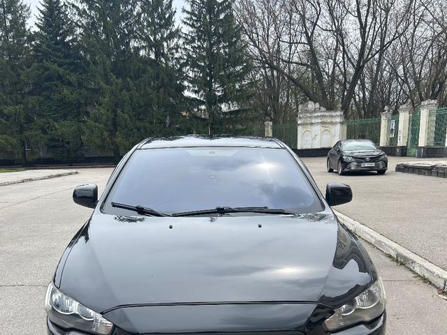 Mitsubishi Lancer - фото 1