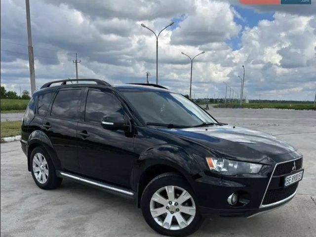 Mitsubishi Outlander - фото 1