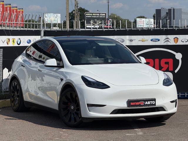 Tesla Model Y - фото 1
