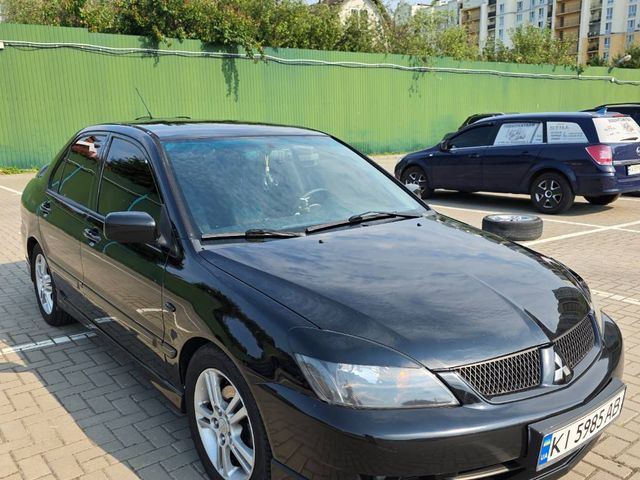 Mitsubishi Lancer - фото 3