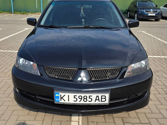 Mitsubishi Lancer - фото 2