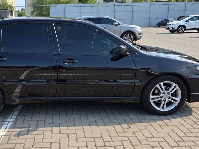 Mitsubishi Lancer - фото 4