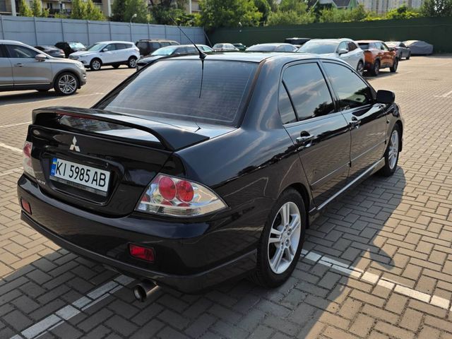 Mitsubishi Lancer - фото 5