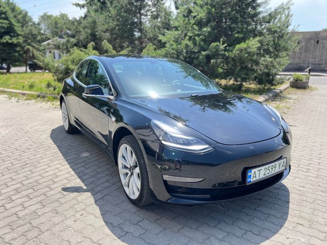 Tesla Model 3 - фото 1
