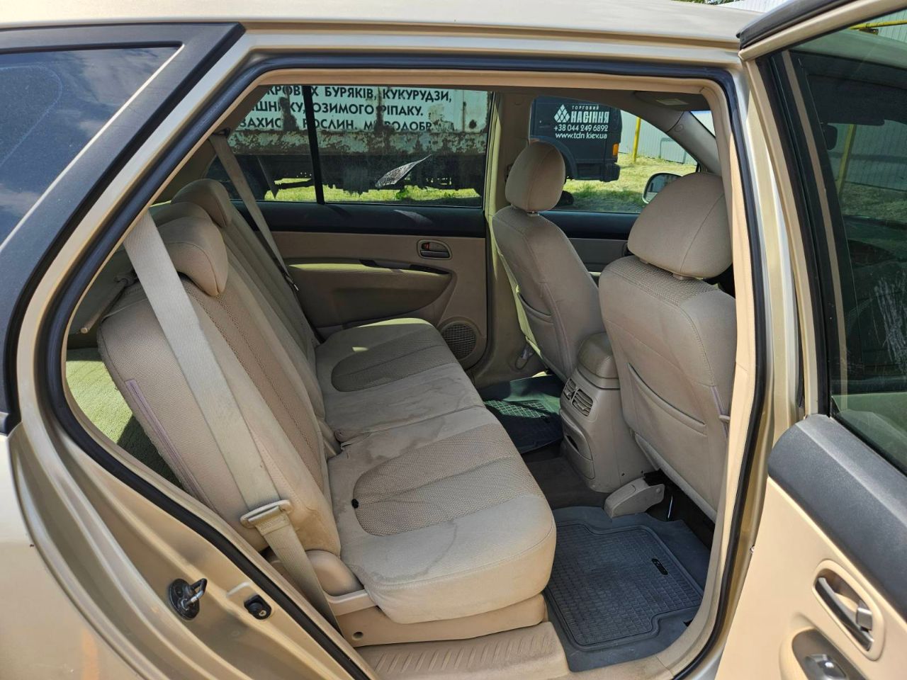 Kia Carens - фото 9