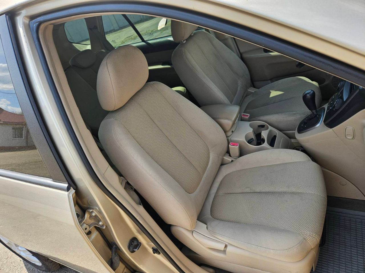 Kia Carens - фото 12