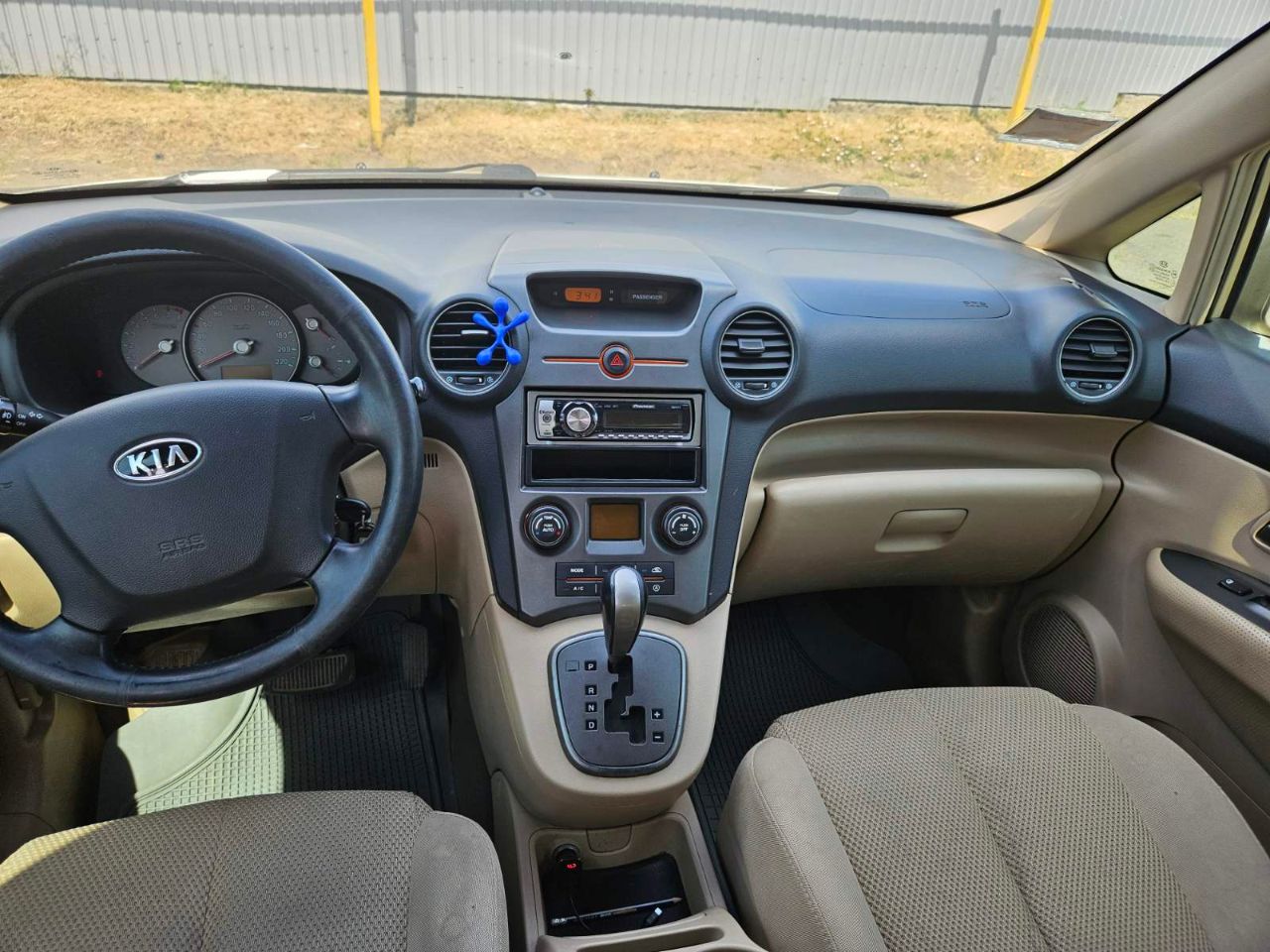 Kia Carens - фото 7