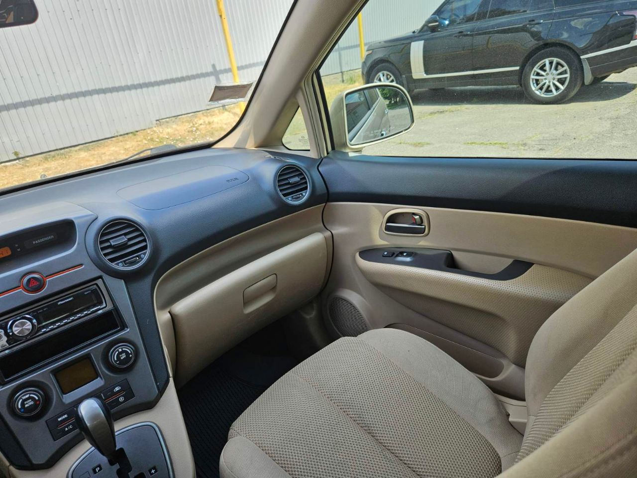 Kia Carens - фото 2