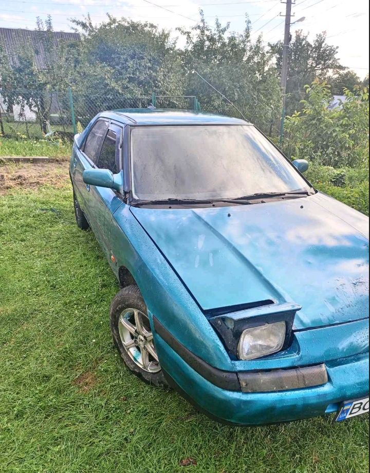 Mazda 323 - фото 4