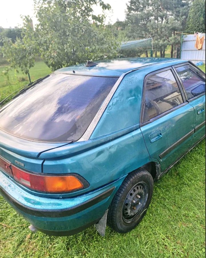 Mazda 323 - фото 5