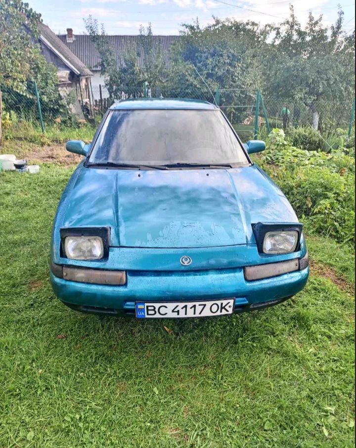 Mazda 323 - фото 1