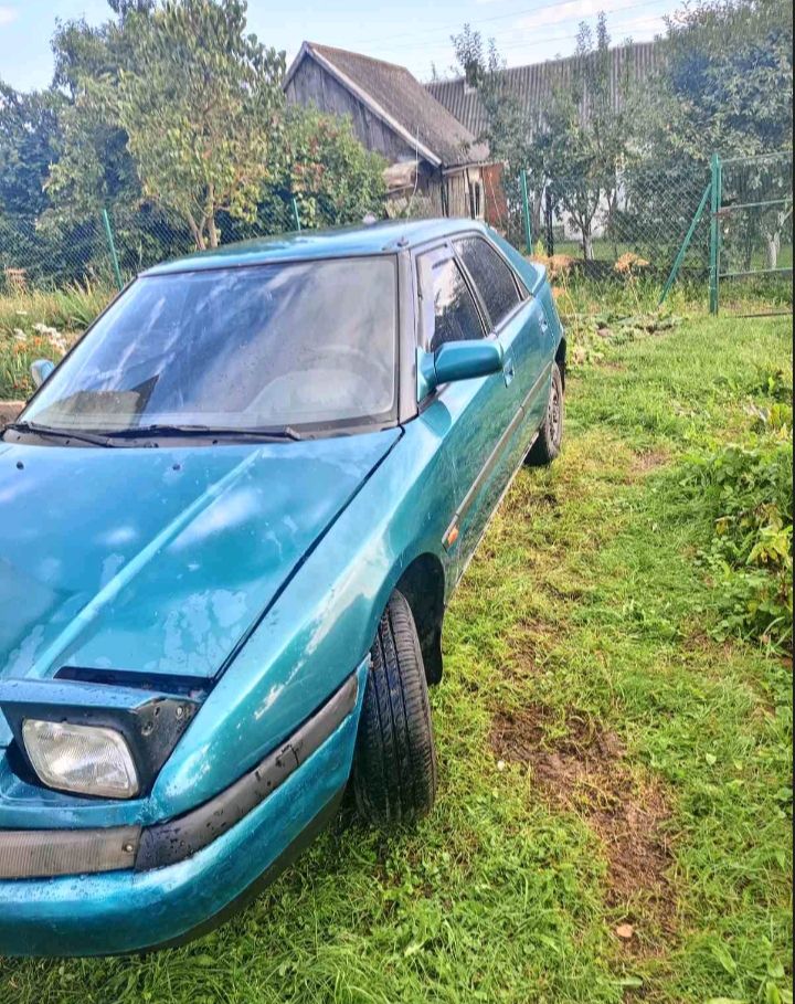 Mazda 323 - фото 3