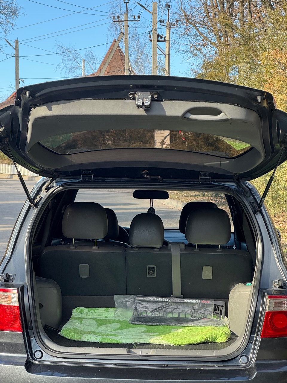 Kia Carens - фото 8