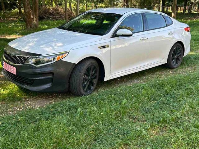 Kia Optima - фото 1
