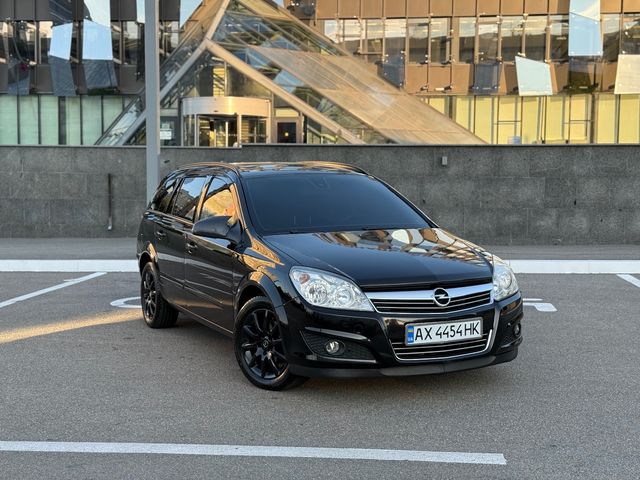 Opel Astra - фото 1