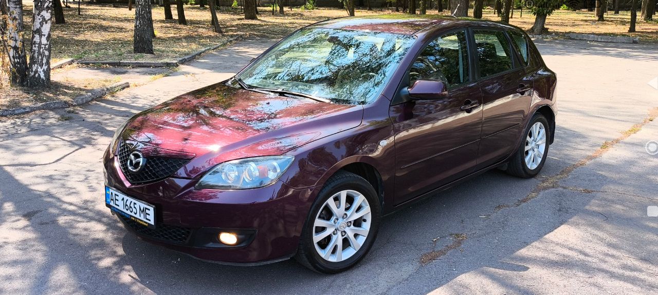 Mazda 3 - фото 1